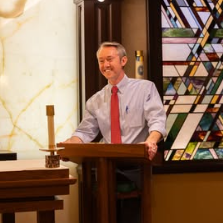 Jared Dees Speaking in a Chapel